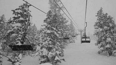 chairlift covered in snow